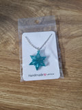 Glitter snowflake pendant.
