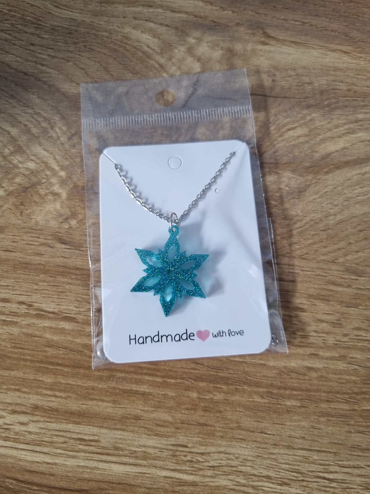 Glitter snowflake pendant.
