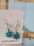 Glitter snowflake earrings.