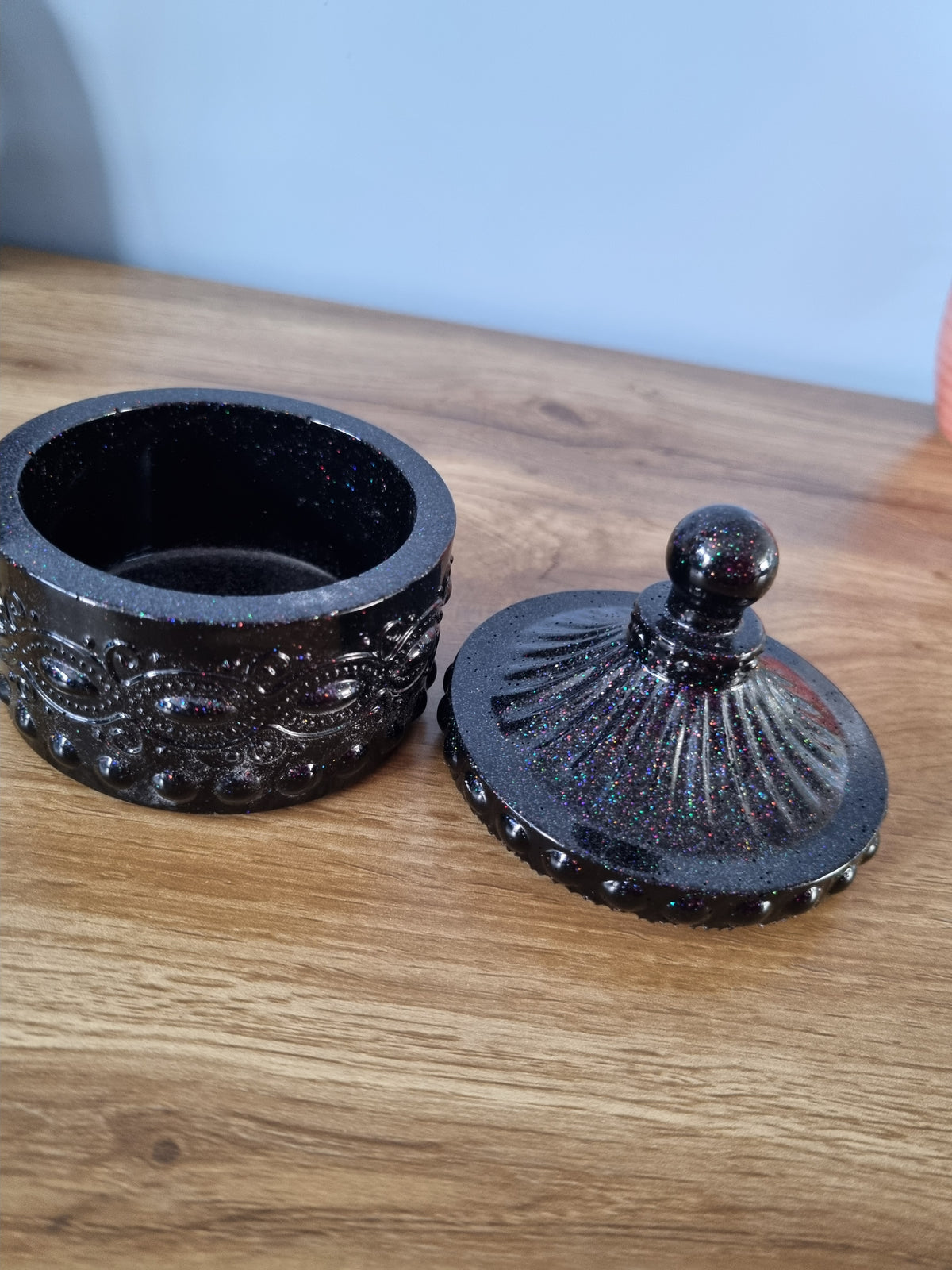 Small decorative storage jar.