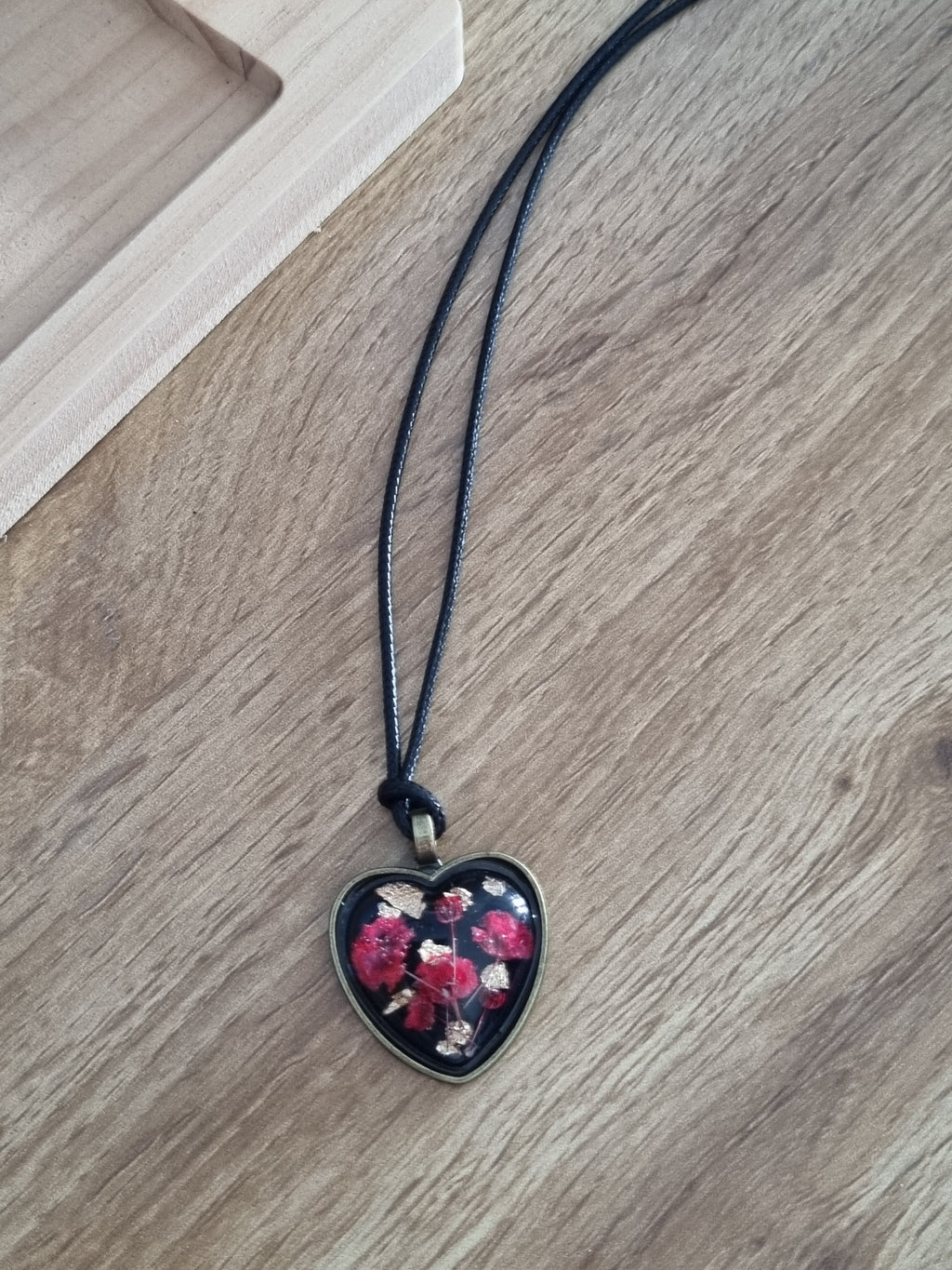 Heart and flowers pendant